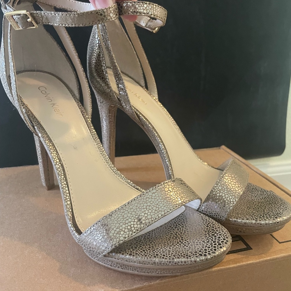 Calvin Klein “Vicky”, gold ankle strap sling backs